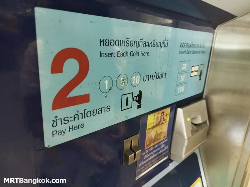 Insert Thai baht notes and coins